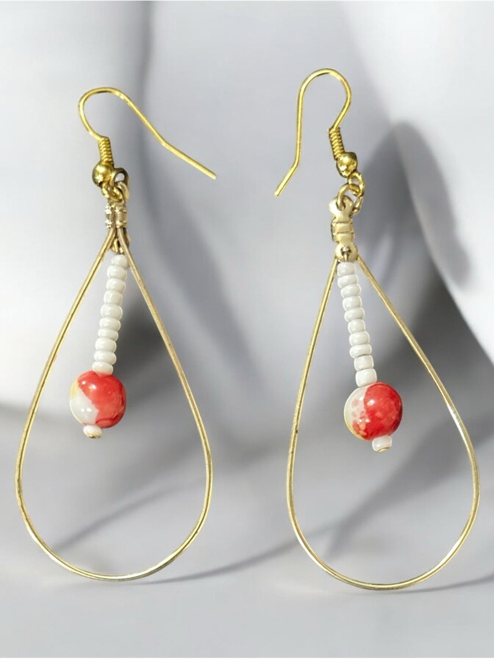 Gold Tone Teardrop Earrings with White Beads and Coral Accent